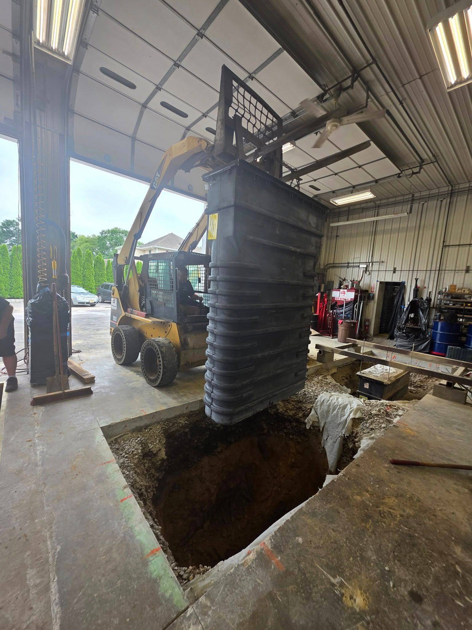 Inground lift pit excavation and installation